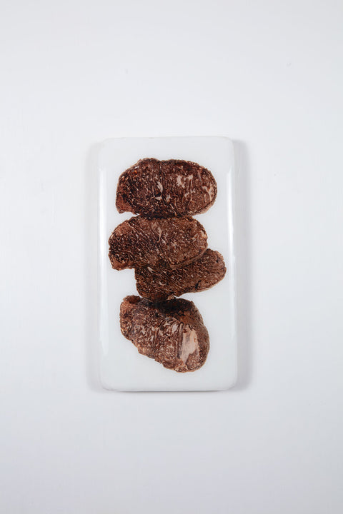Four black truffles (20cm x 35cm)