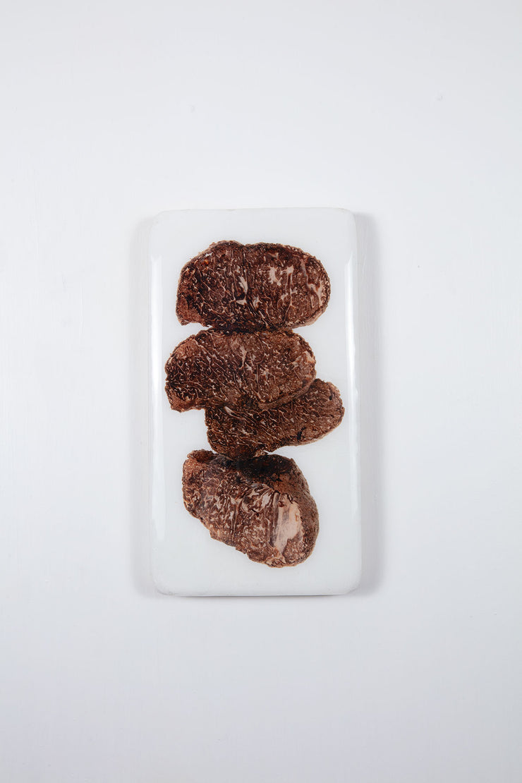 Four black truffles (20cm x 35cm)