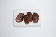 Four black truffles (20cm x 35cm)