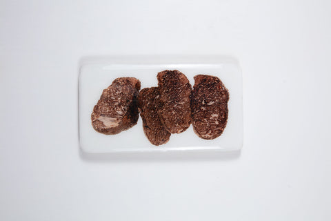 Four black truffles (20cm x 35cm)
